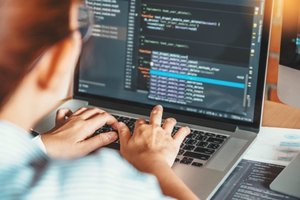 Developing,Programmer,Reading,Computer,Codes,Development,Website,Design,And,Coding
