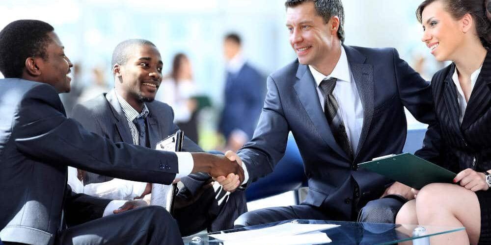 Business meeting with men shaking hands