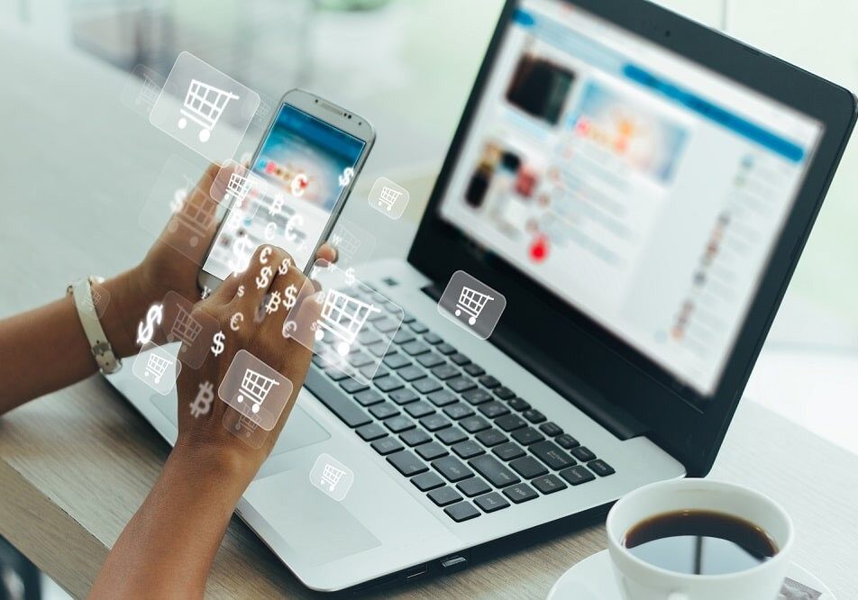 Businesswoman phone and laptop using , online shopping concept.