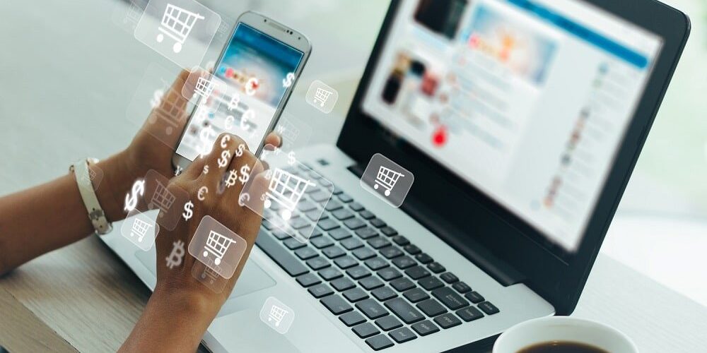 Businesswoman phone and laptop using , online shopping concept.