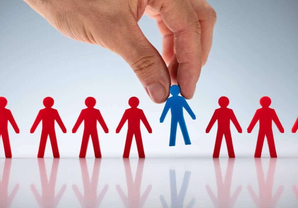 Hand picking out the ideal customer from a long line of possibilities