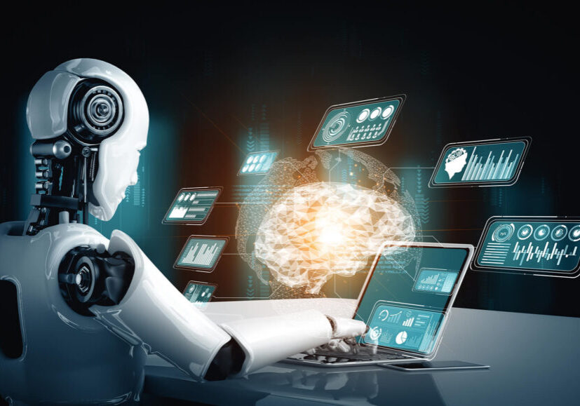 Robot humanoid use laptop and sit at table for big data analytic using AI thinking brain