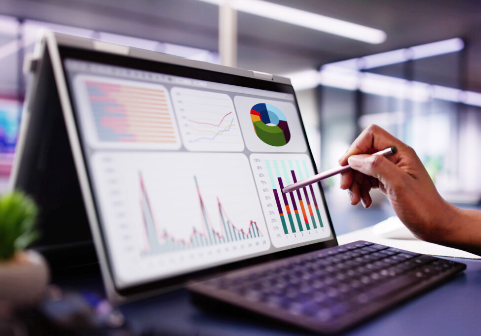 African American woman analyzing financial data