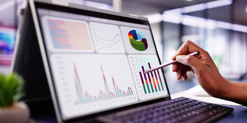African American woman analyzing financial data