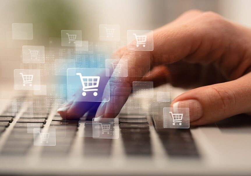 Business woman hand typing on keyboard with online shopping concept