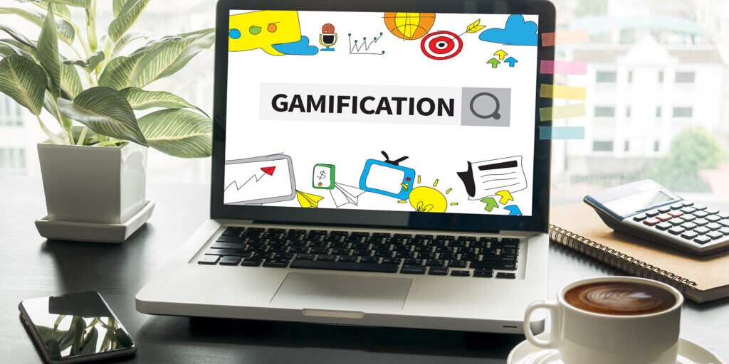 GAMIFICATION Computing Computer Laptop with screen on table