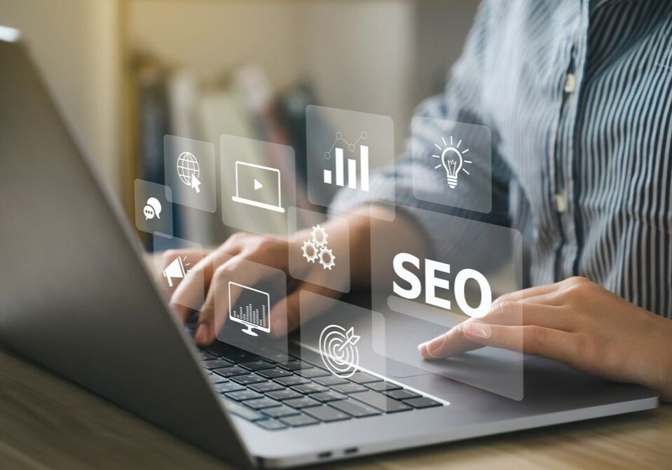 Woman typing on laptop looking for SEO