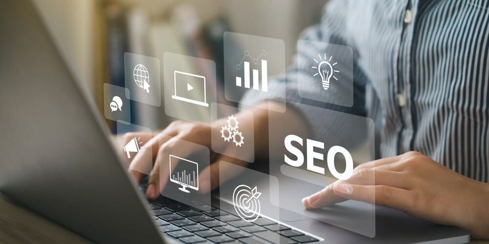 Woman typing on laptop looking for SEO