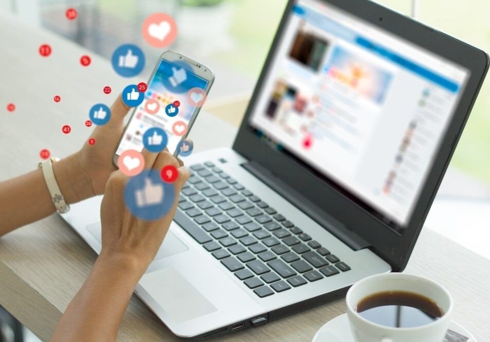 Social media manager checking mobile phone